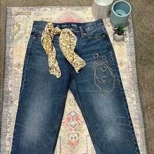 Straight leg ski high medium wash jeans.